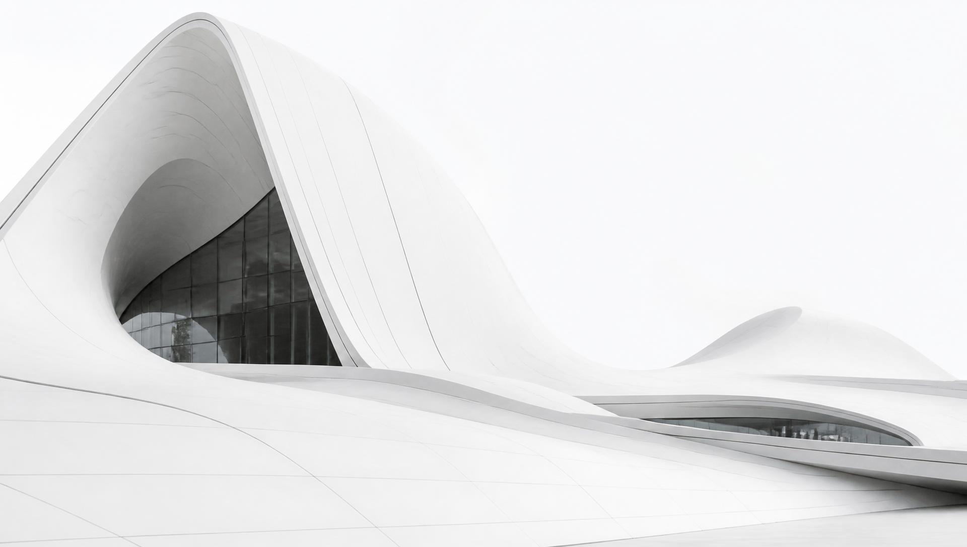 Sweeping white parametric architectural shells in bright daylight